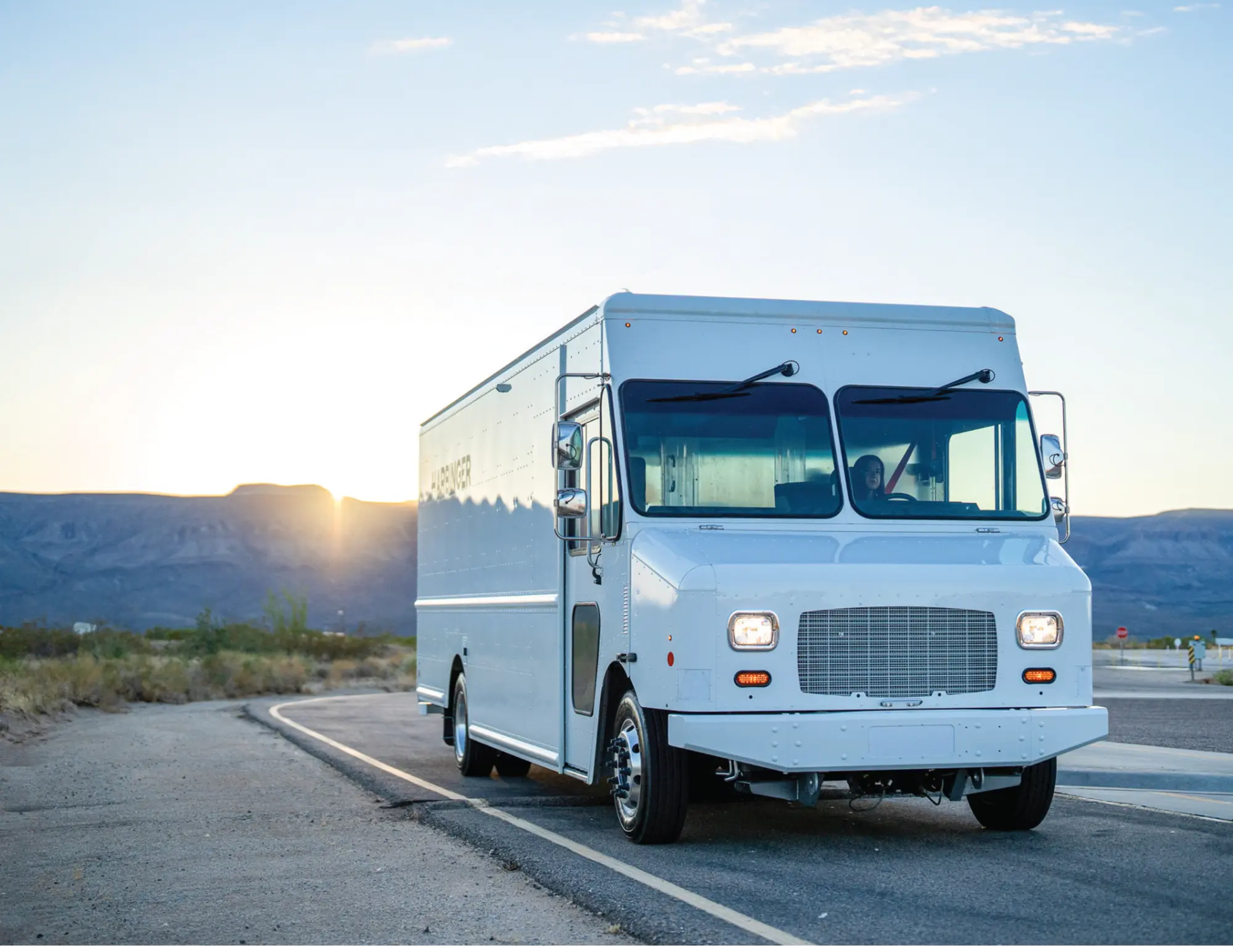Harbinger EV step van, front three-quarter view on road