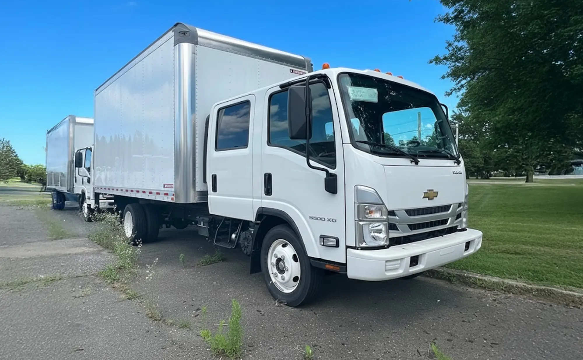 Chevrolet LCF 5500XG crew cab with 16-foot box body, front three-quarter view