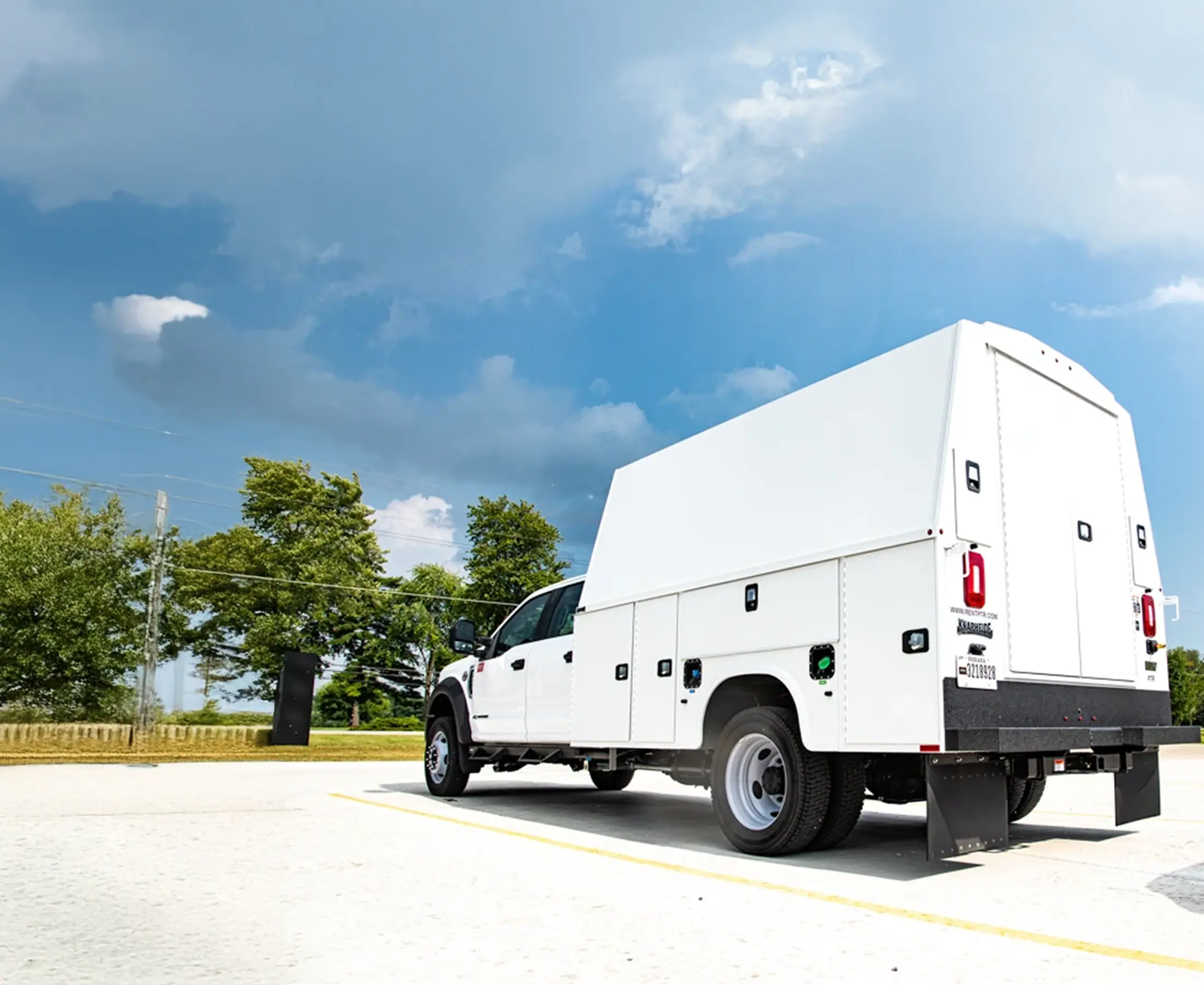 Silverado 3500HD with enclosed Knapheide KUV utility body, rear three-quarter view